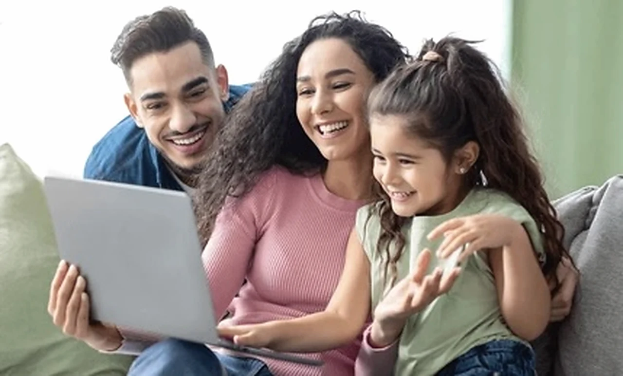 Parents and child connecting together during an online conversation